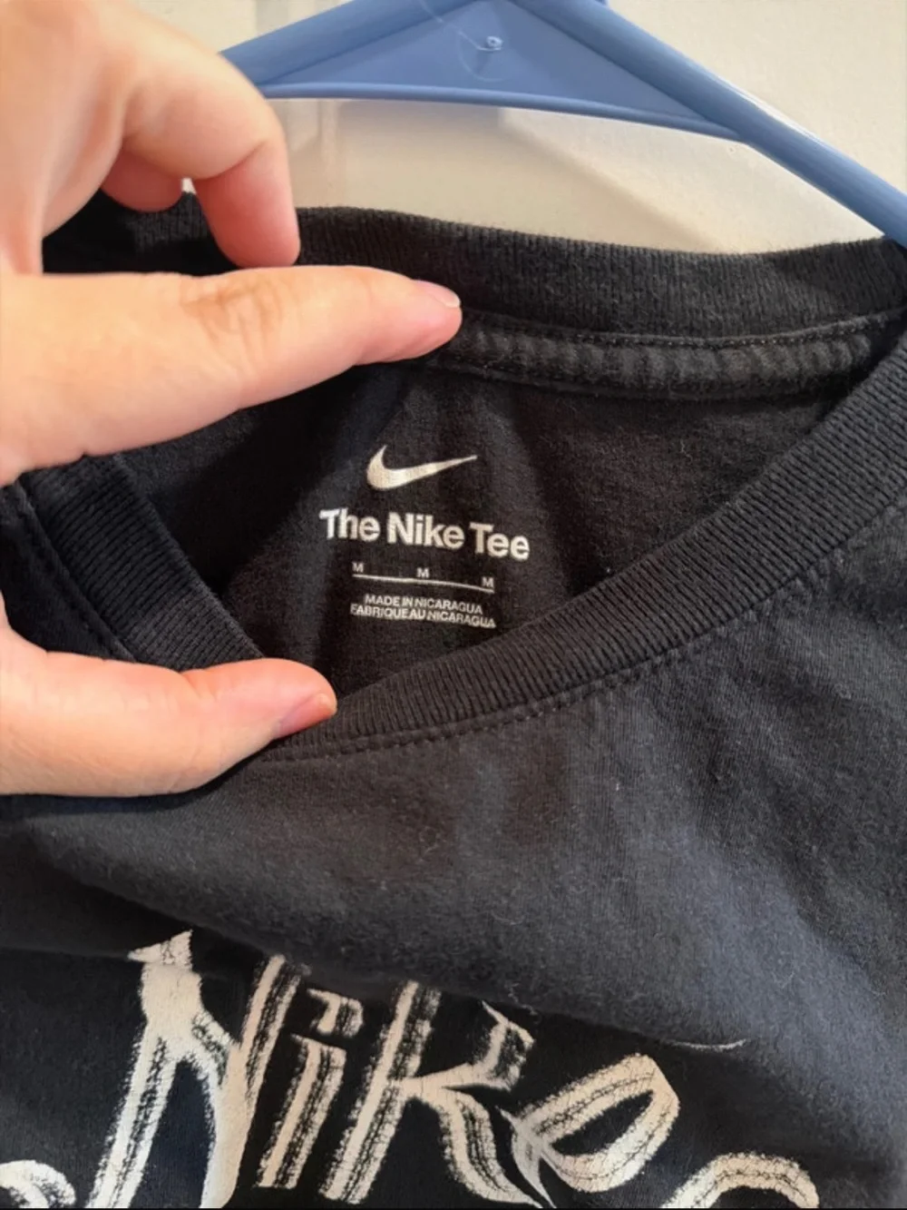 Nike Black Short Sleeve Kids Logo Tee with White Embroidered Script